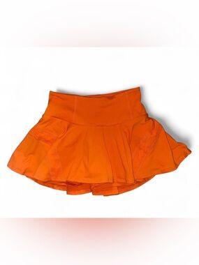 FP movement free people orange pleats and thank you tennis skirt skort XS NWOT